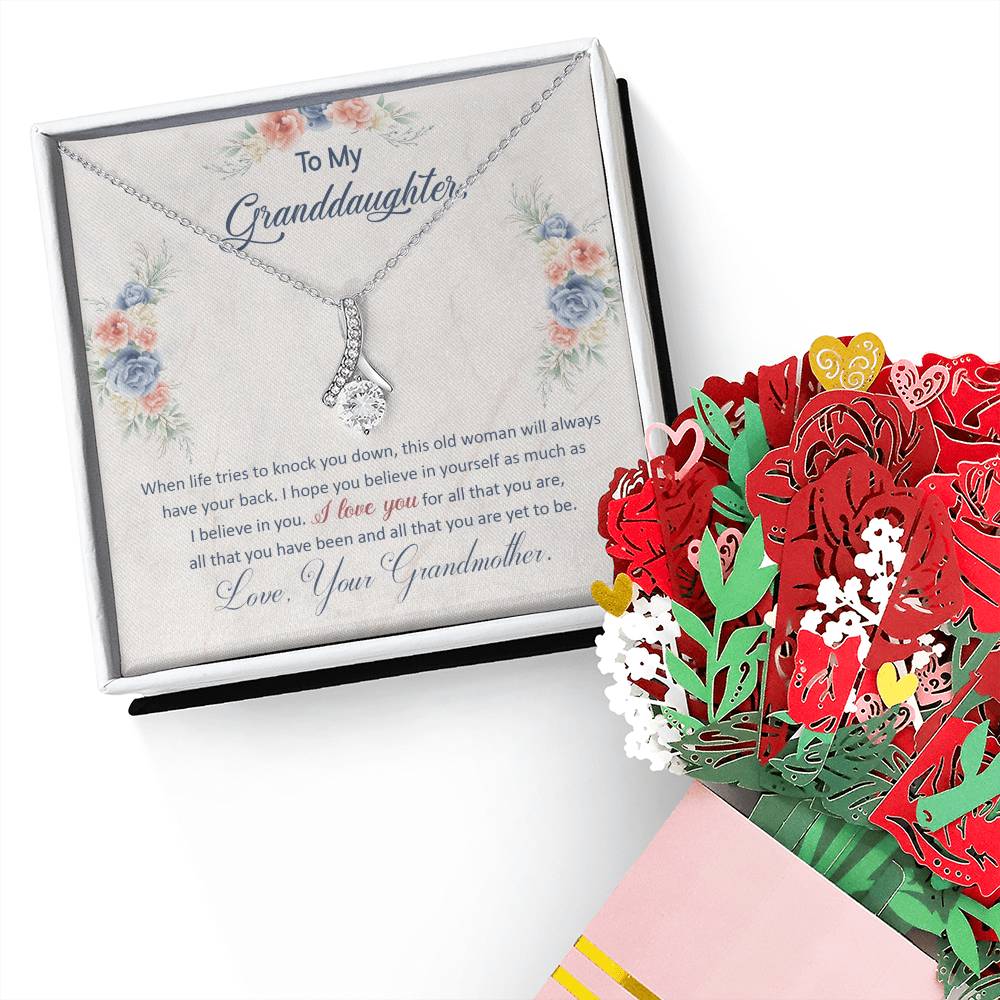 To My Granddaughter, This Old Woman Will Always Have Your Back Aluring Beauty Necklace and Sweet Devotion Bouquet
